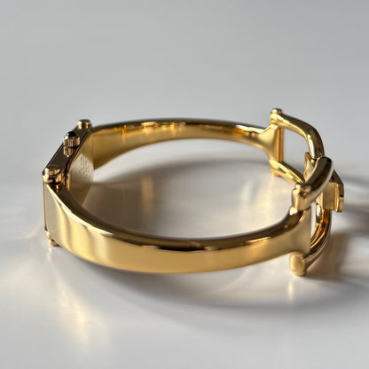 Gucci 1990s Black Rectangular Dial Gold Plated Bangle Watch
