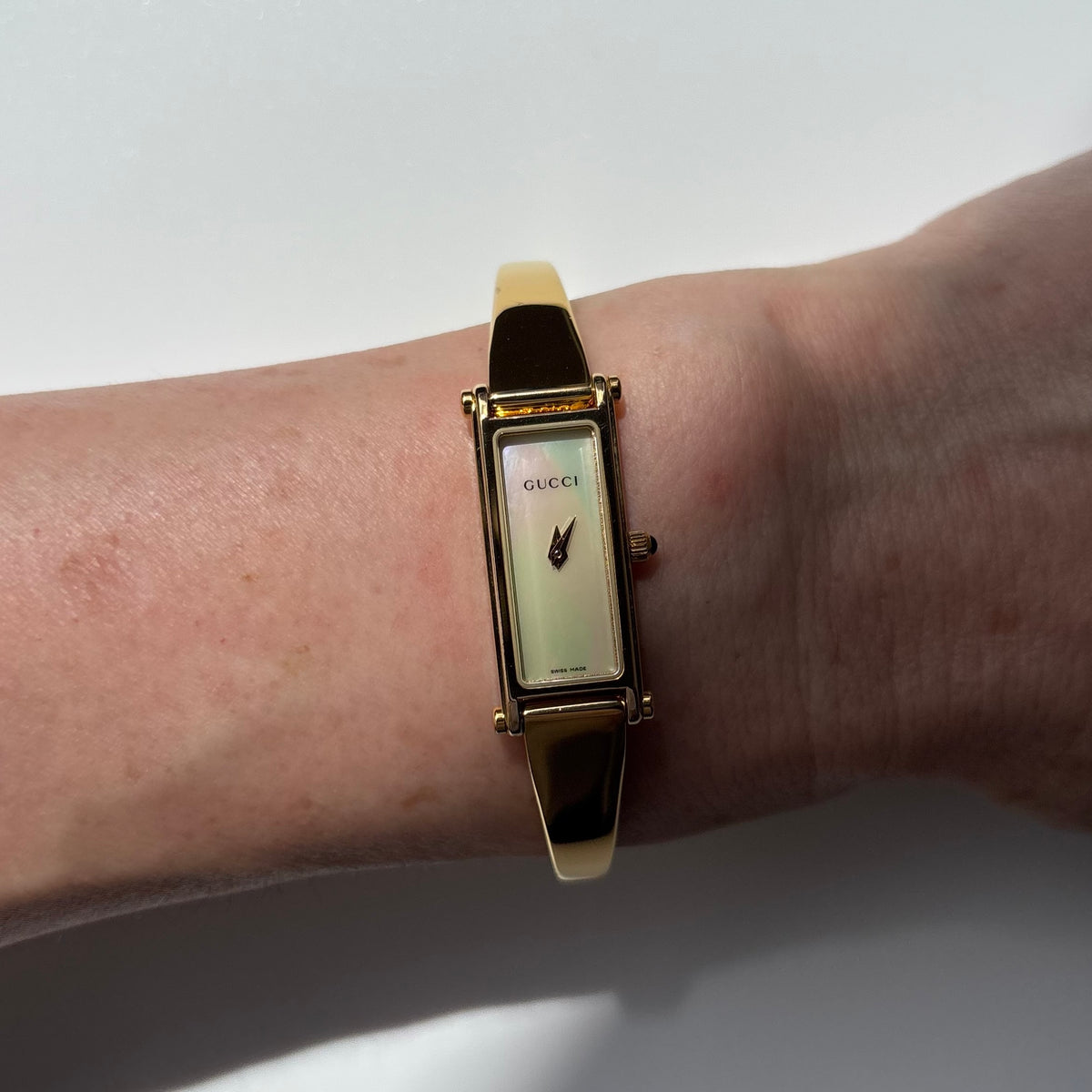 Gucci 1990s Seashell Dial Rectangular Gold-Plated Bangle Watch