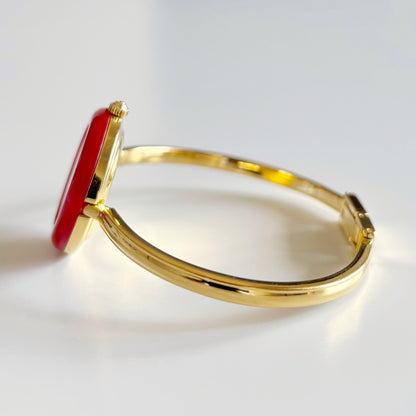 Gucci 1990s Interchangeable Bezel Gold Plated Bangle Watch with 12 bezels, case