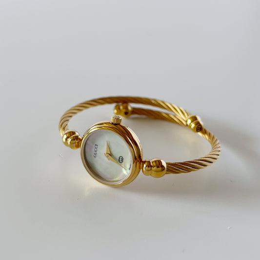 Gucci 1990s Seashell Dial Gold Plated Cable Bangle Watch