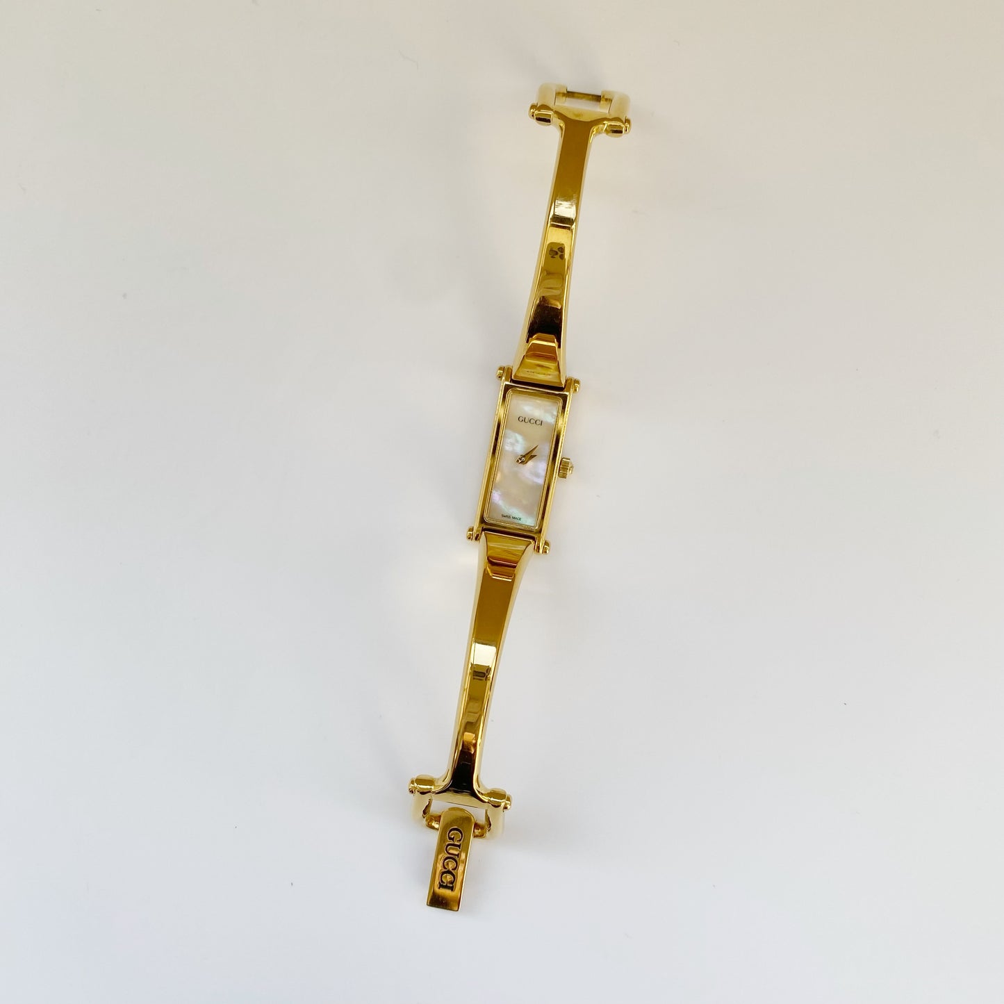 Gucci 1990s Rectangular Seashell Dial Gold Plated Bangle Watch