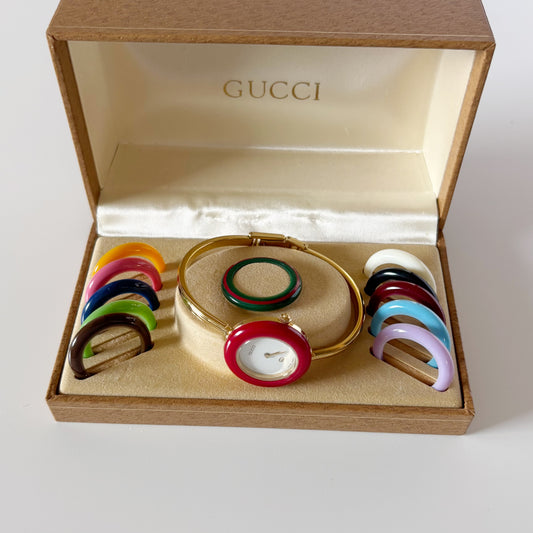 Gucci 1990s Interchangeable Bezel Gold Plated Bangle Watch with 12 bezels, case (8/30)