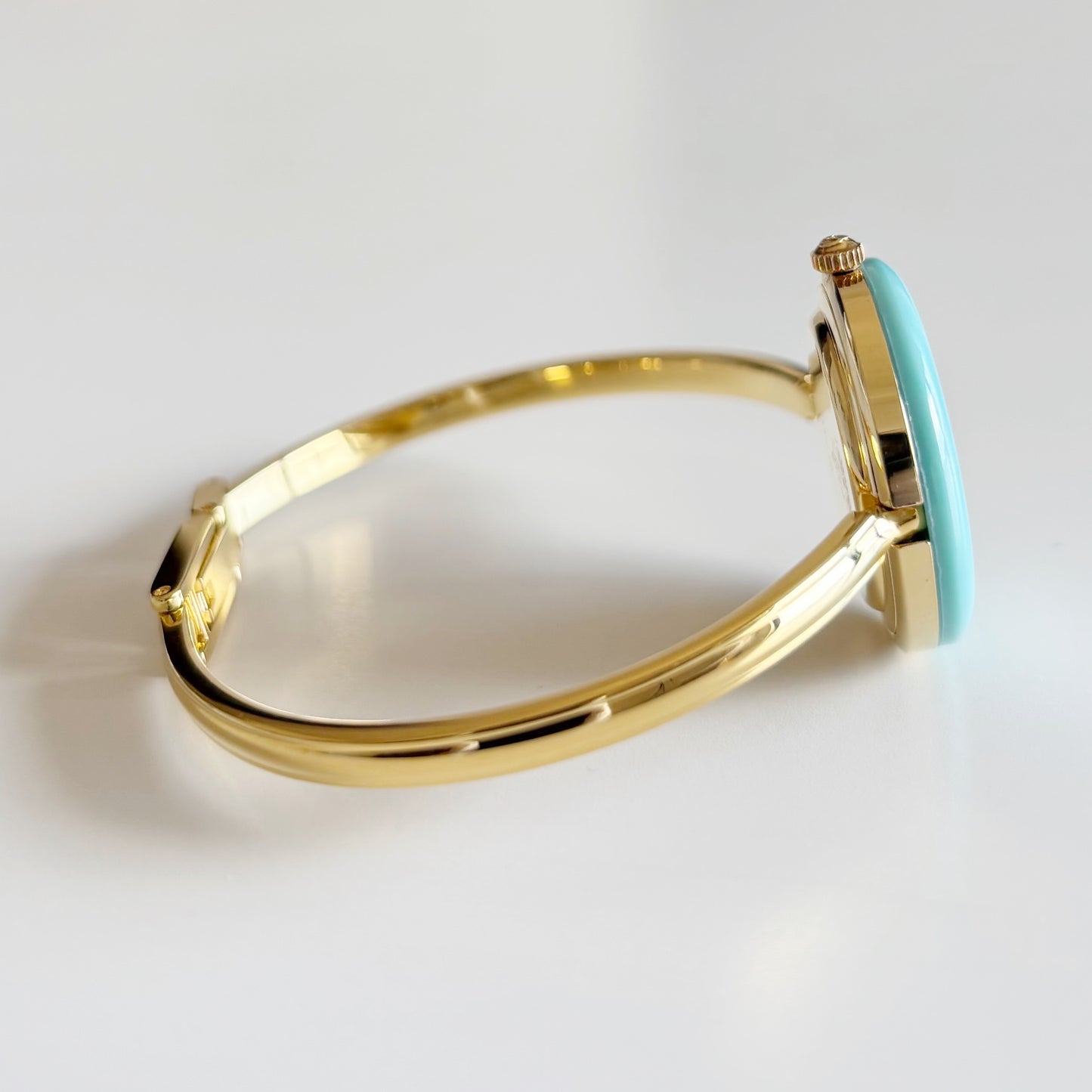 Gucci 1990s Interchangeable Bezel Gold Plated Bangle Watch with 12 bezels, case