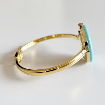 Gucci 1990s Interchangeable Bezel Gold Plated Bangle Watch with 12 bezels, case