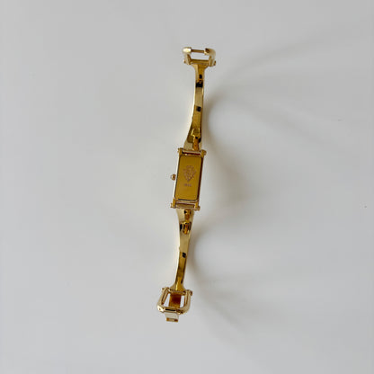 Gucci 1990s Rectangular Gold Dial Gold Plated Bangle Watch
