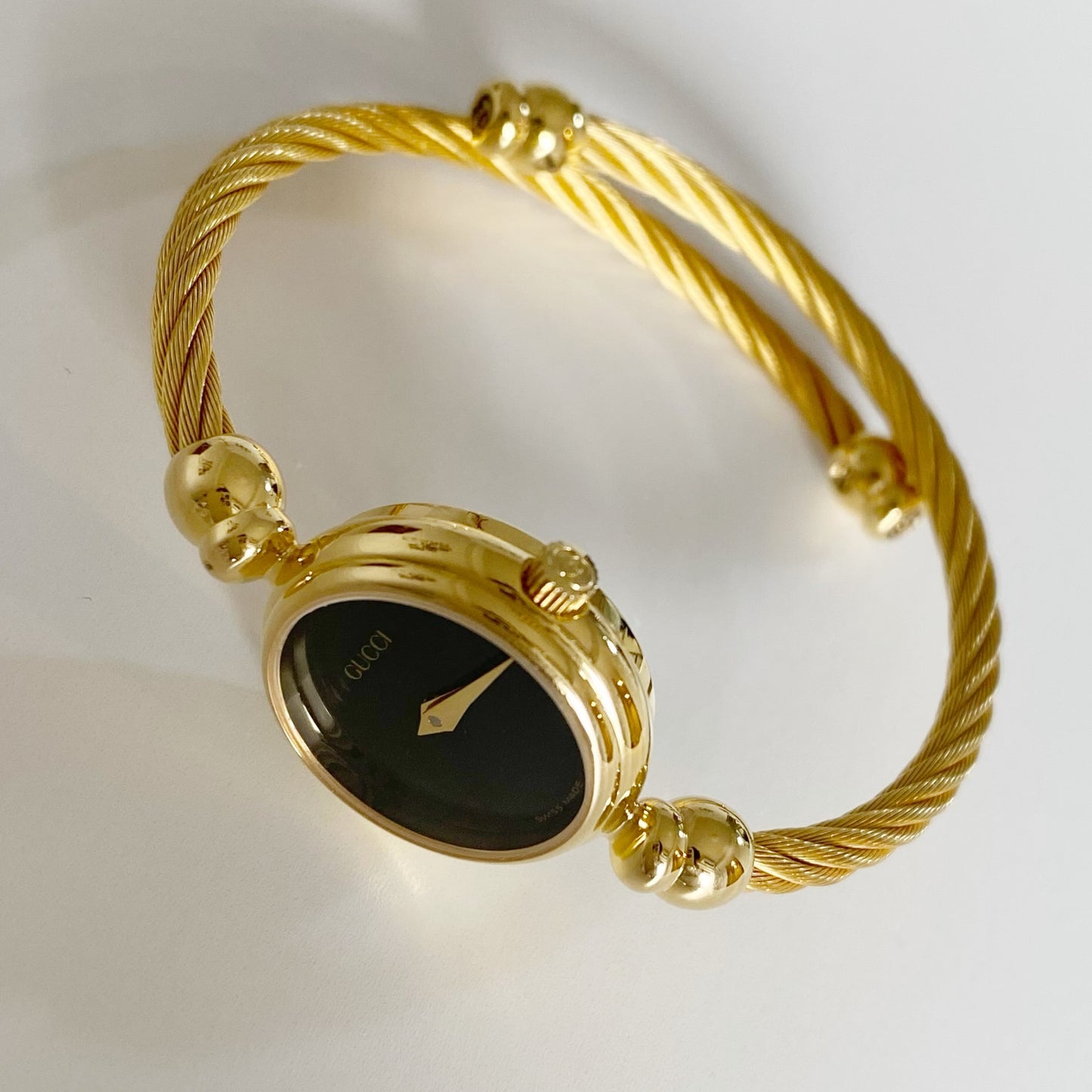 Gucci 1990s Black Dial Gold Plated Cable Bangle Watch