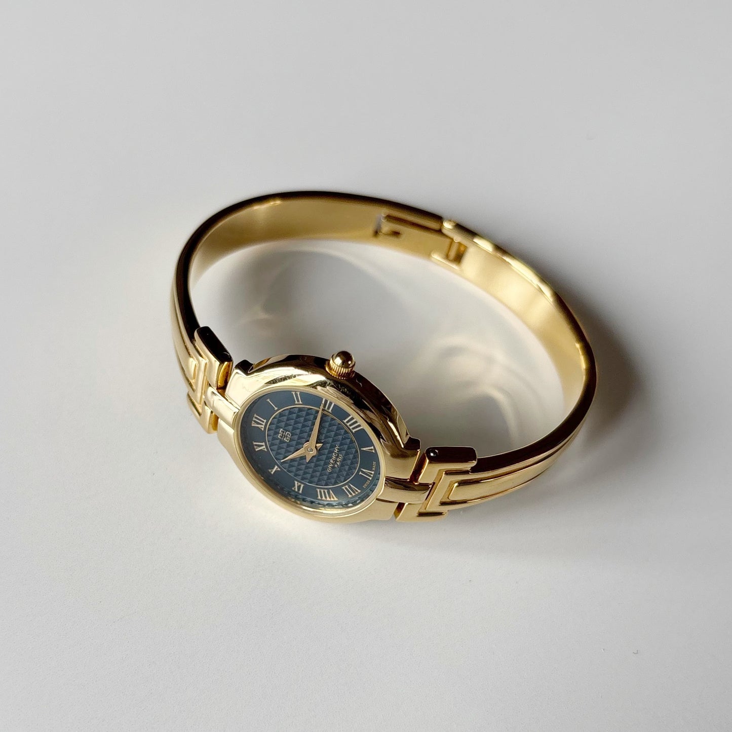 Givenchy 1990s Round Dial Gold Plated Bangle Watch