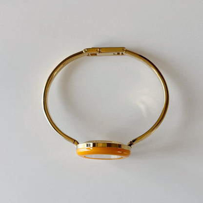 Gucci 1990s Interchangeable Bezel Gold Plated Bangle Watch with 12 bezels, case
