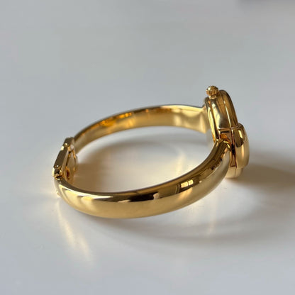 Gucci 1990s Round Dial Gold Plated Bangle Watch