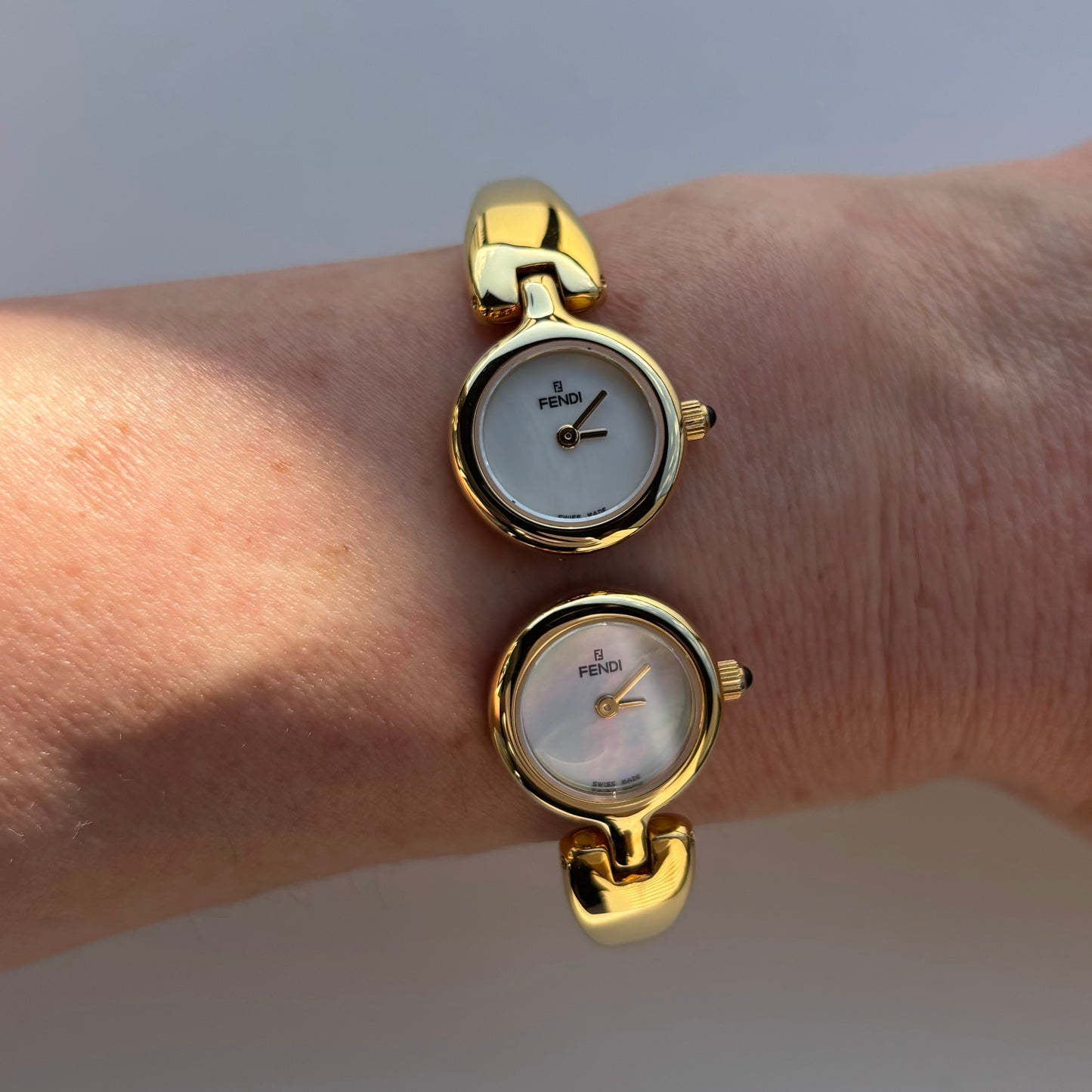 Fendi 1990s Seashell Dial Two Time Zone Gold Plated Bangle Watch