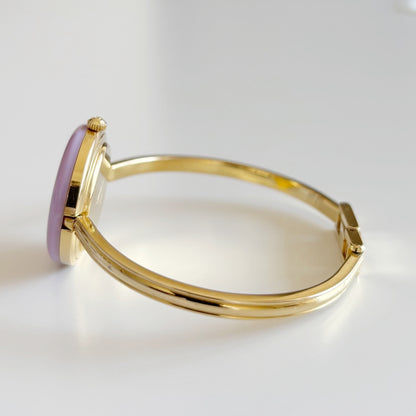 Gucci 1990s Interchangeable Bezel Gold Plated Bangle Watch with 12 bezels, case