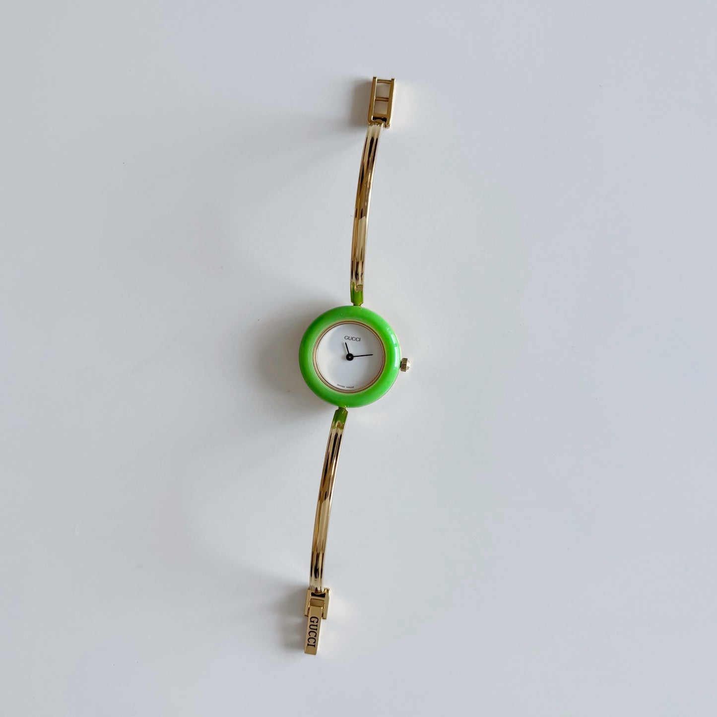 Gucci 1990s Interchangeable Bezel Gold Plated Bangle Watch with 12 bezels, case
