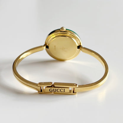 Gucci 1990s Interchangeable Bezel Gold Plated Bangle Watch with 12 bezels, case (Small)