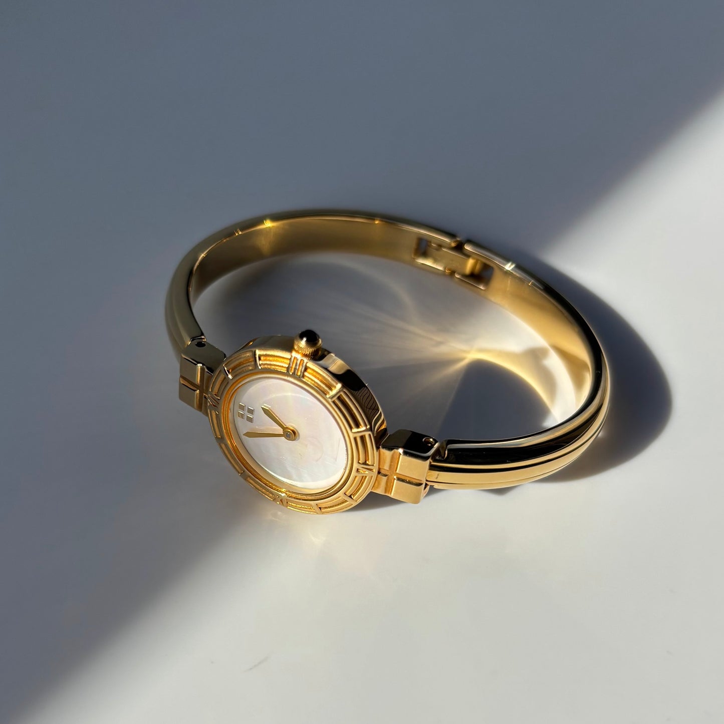 Yves Saint Laurent 1990s Seashell Dial Gold Plated Bangle Watch (Small)