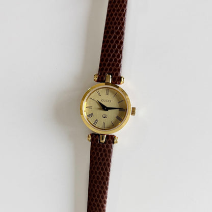Gucci 1990s Round Gold Dial Gold Plated Watch