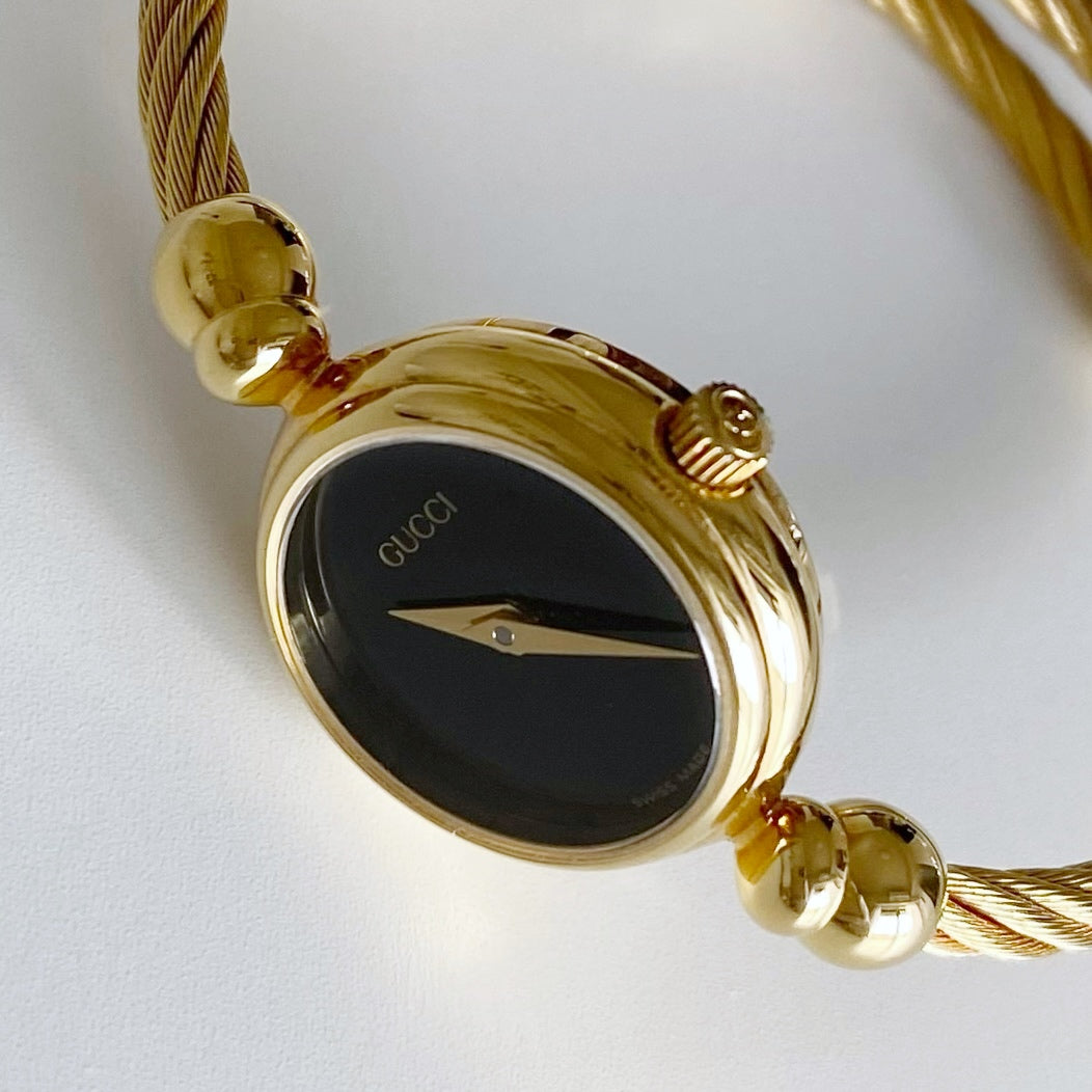 Gucci 1990s Black Dial Gold Plated Bangle Watch