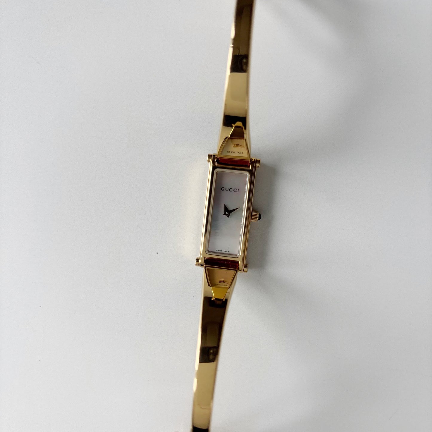 Gucci 1990s Seashell Rectangular Dial Gold Plated Bangle Watch