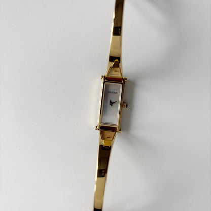 Gucci 1990s Seashell Rectangular Dial Gold Plated Bangle Watch