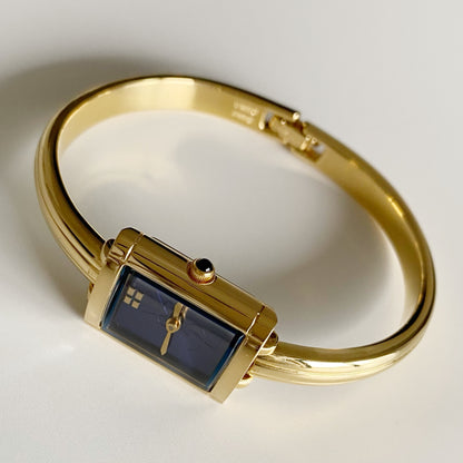 Yves Saint Laurent 1990s Gold Plated Bangle Watch