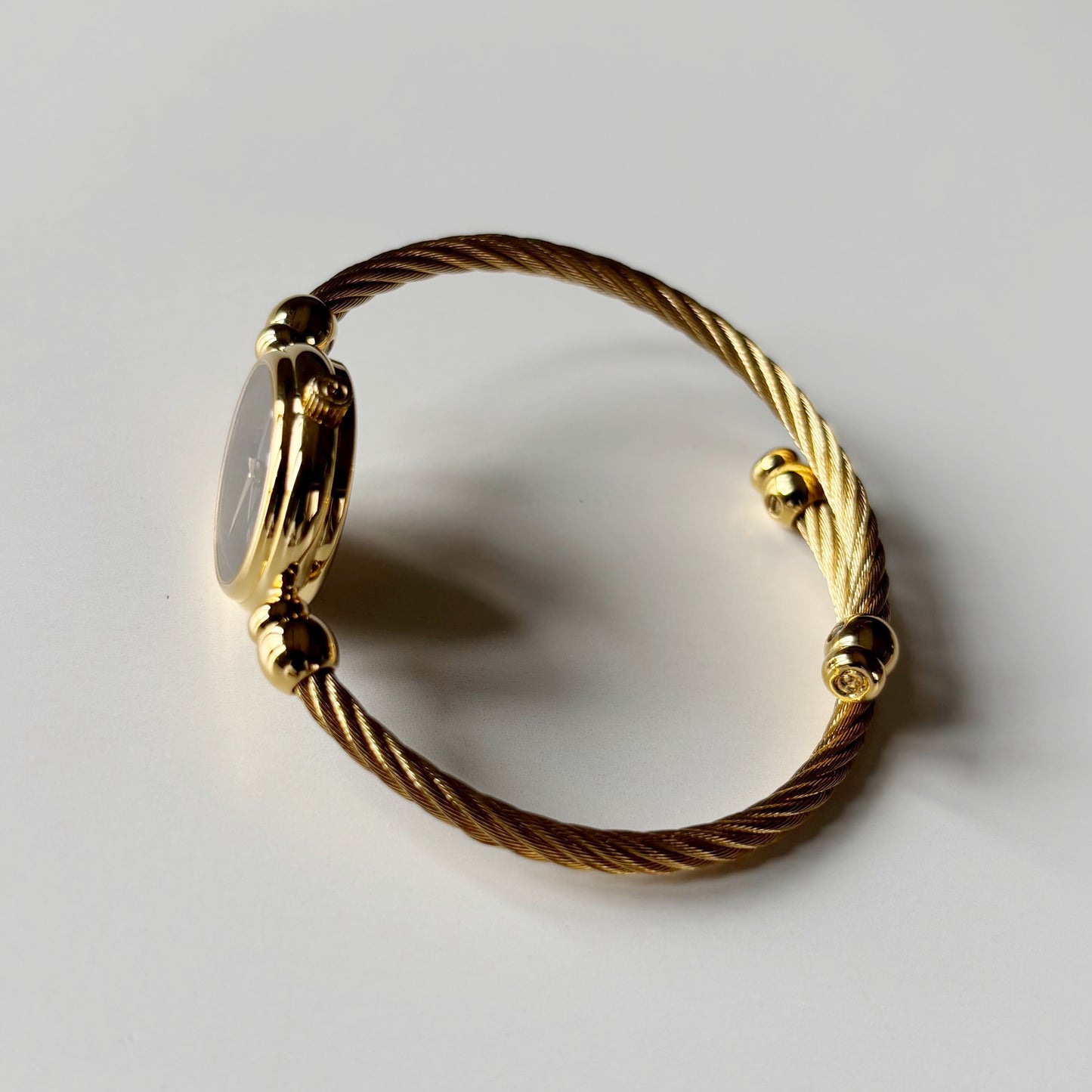 Gucci 1990s Black Dial Gold Plated Cable Bangle Watch