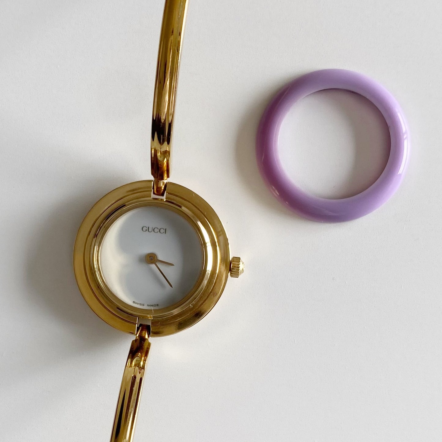 Gucci 1990s Interchangeable Bezel Gold Plated Bangle Watch with 12 bezels, case