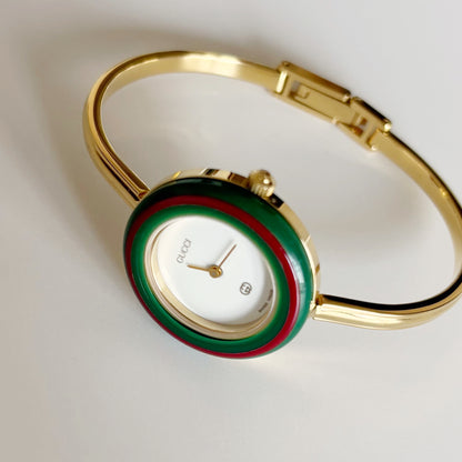 Gucci 1990s Interchangeable Bezel Gold Plated Bangle Watch with 12 bezels, case