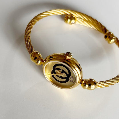 Gucci 1990s Gold Plated Cable Bangle Watch