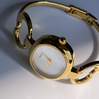 Gucci 1990s Seashell Dial Oval Gold Plated Bangle Watch