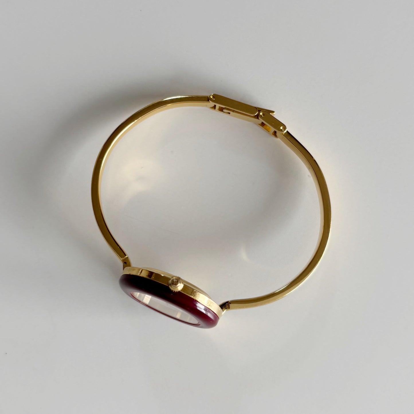 Gucci 1990s Interchangeable Bezel Gold Plated Bangle Watch with 12 bezels, case