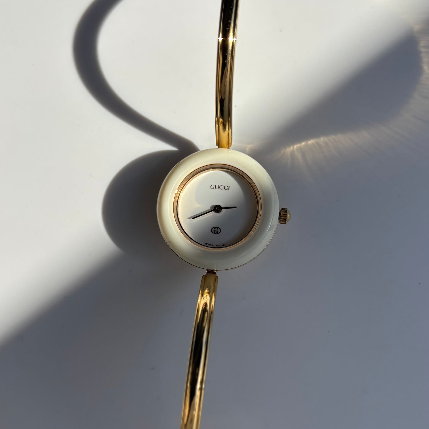 Gucci 1980s Interchangeable Bezel Gold Plated Bangle Watch with 12 bezels, case