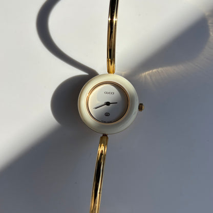 Gucci 1980s Interchangeable Bezel Gold Plated Bangle Watch with 12 bezels, case