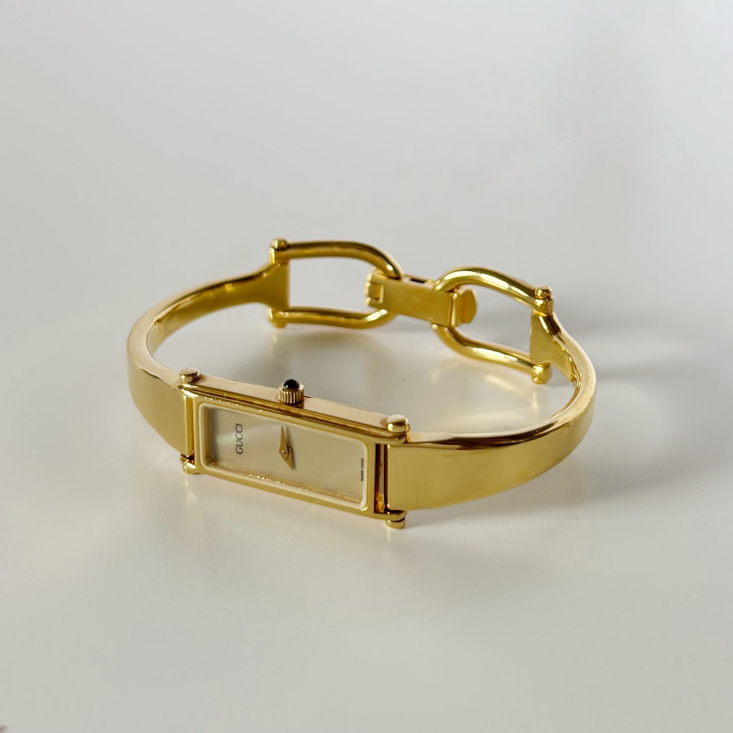 Gucci 1990s Rectangular Seashell Dial Gold Plated Bangle Watch