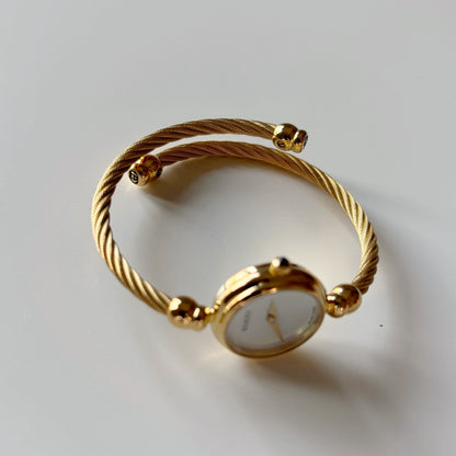 Gucci 1990s Seashell Dial Gold Plated Cable Bangle Watch