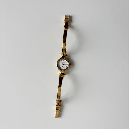 Burberry 1990s Round Dial Gold Plated Bangle Watch