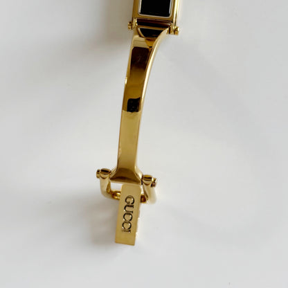 Gucci 1990s Black Dial Rectangular Gold Plated Bangle Watch