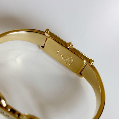 Gucci 1990s Cream Dial Rectangular Gold Plated Bangle Watch