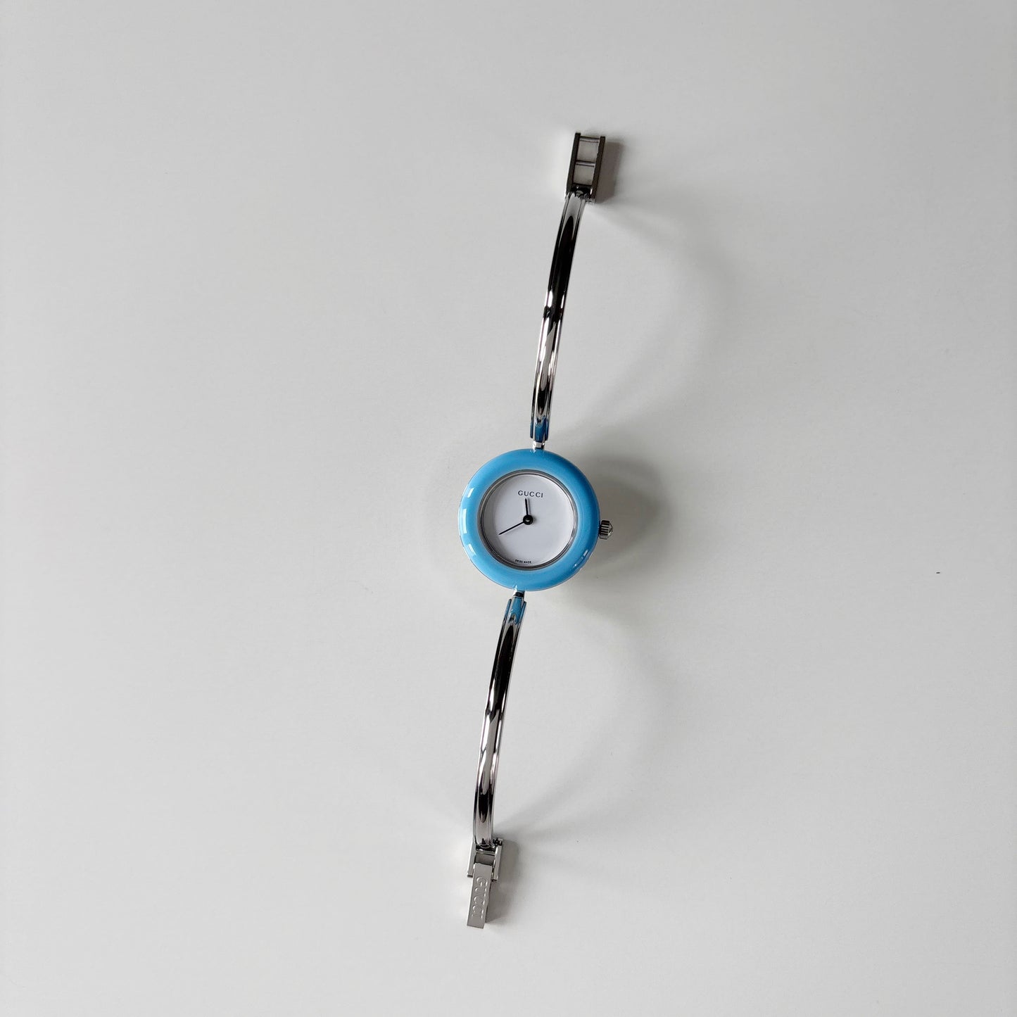 Gucci 1990s Interchangeable Bezel Silver Stainless steel Bangle Watch with 12 bezels, case