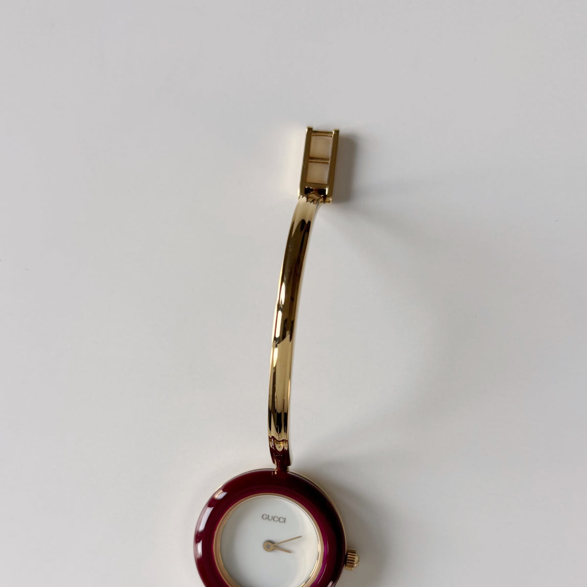 Gucci 1990s Interchangeable Bezel Gold Plated Bangle Watch with 12 bezels, case