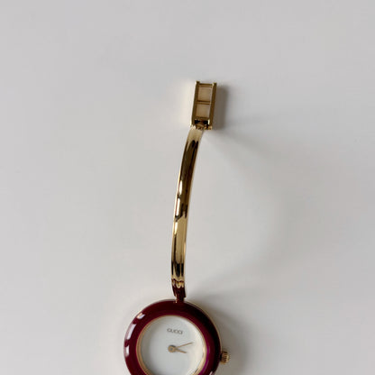 Gucci 1990s Interchangeable Bezel Gold Plated Bangle Watch with 12 bezels, case