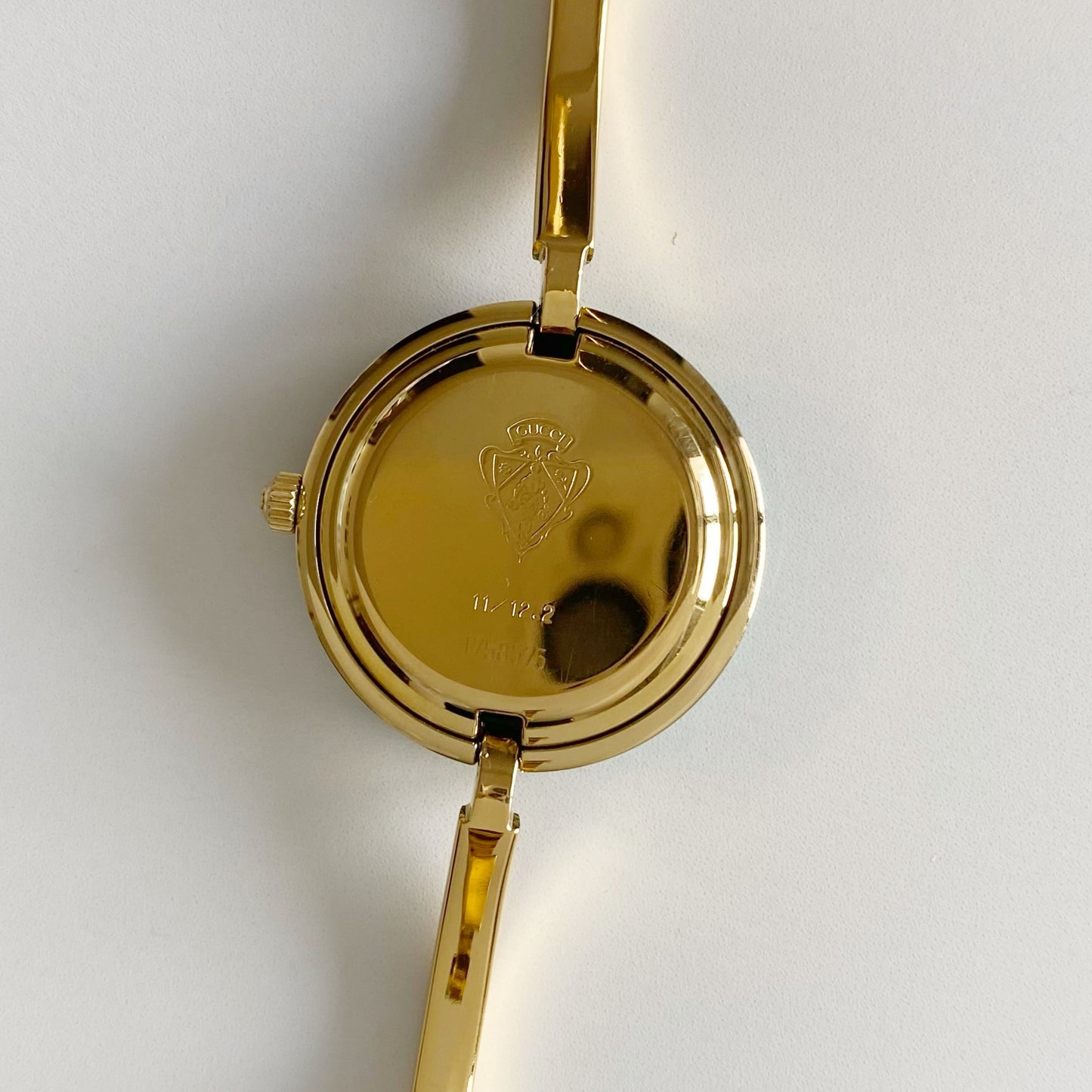 Gucci 1990s Interchangeable Bezel Gold Plated Bangle Watch with 12 bezels, case