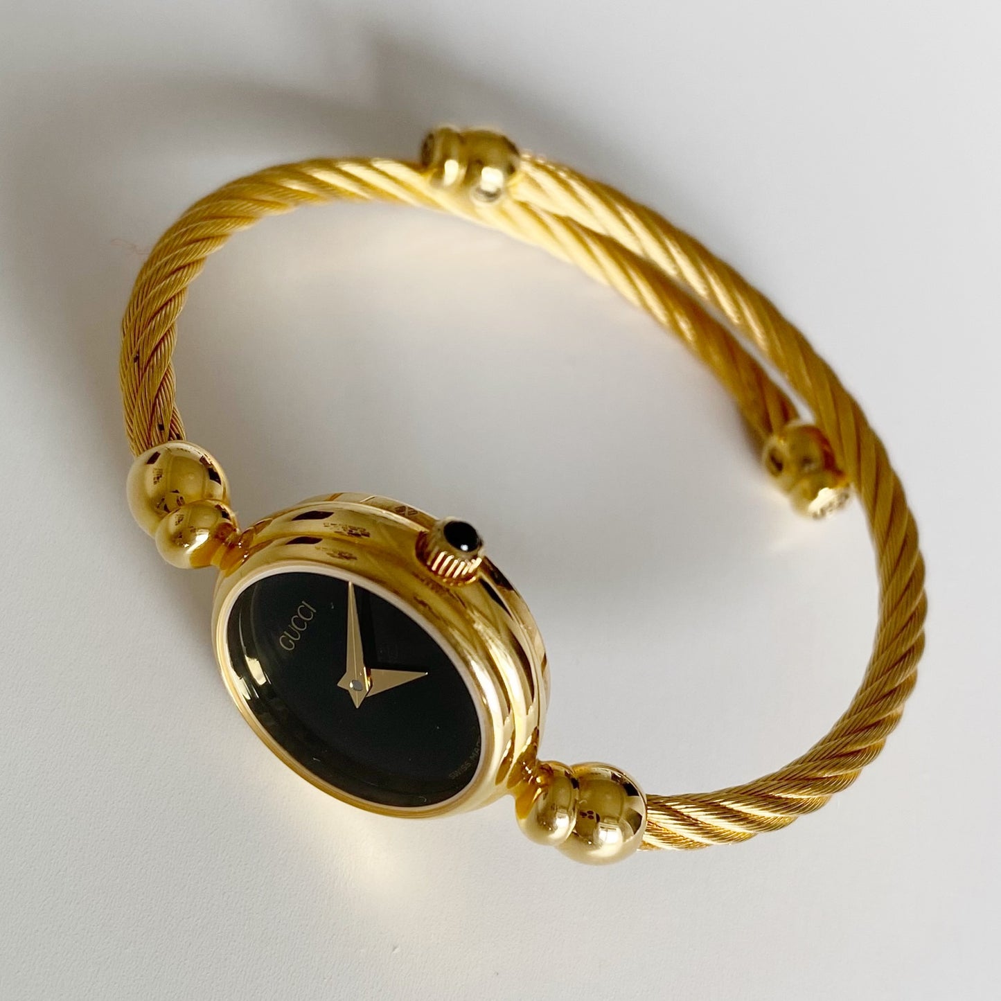 Gucci 1990s Black Dial Gold Plated Cable Bangle Watch