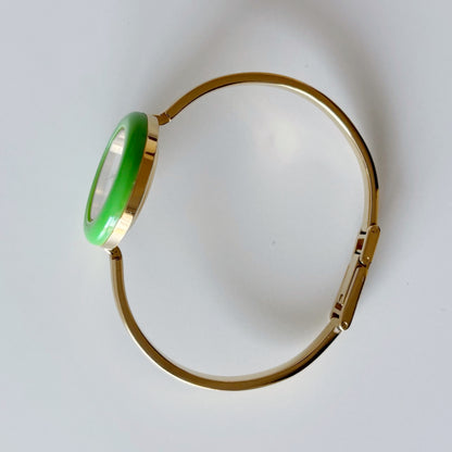Gucci 1990s Interchangeable Bezel Gold Plated Bangle Watch with 12 bezels, case
