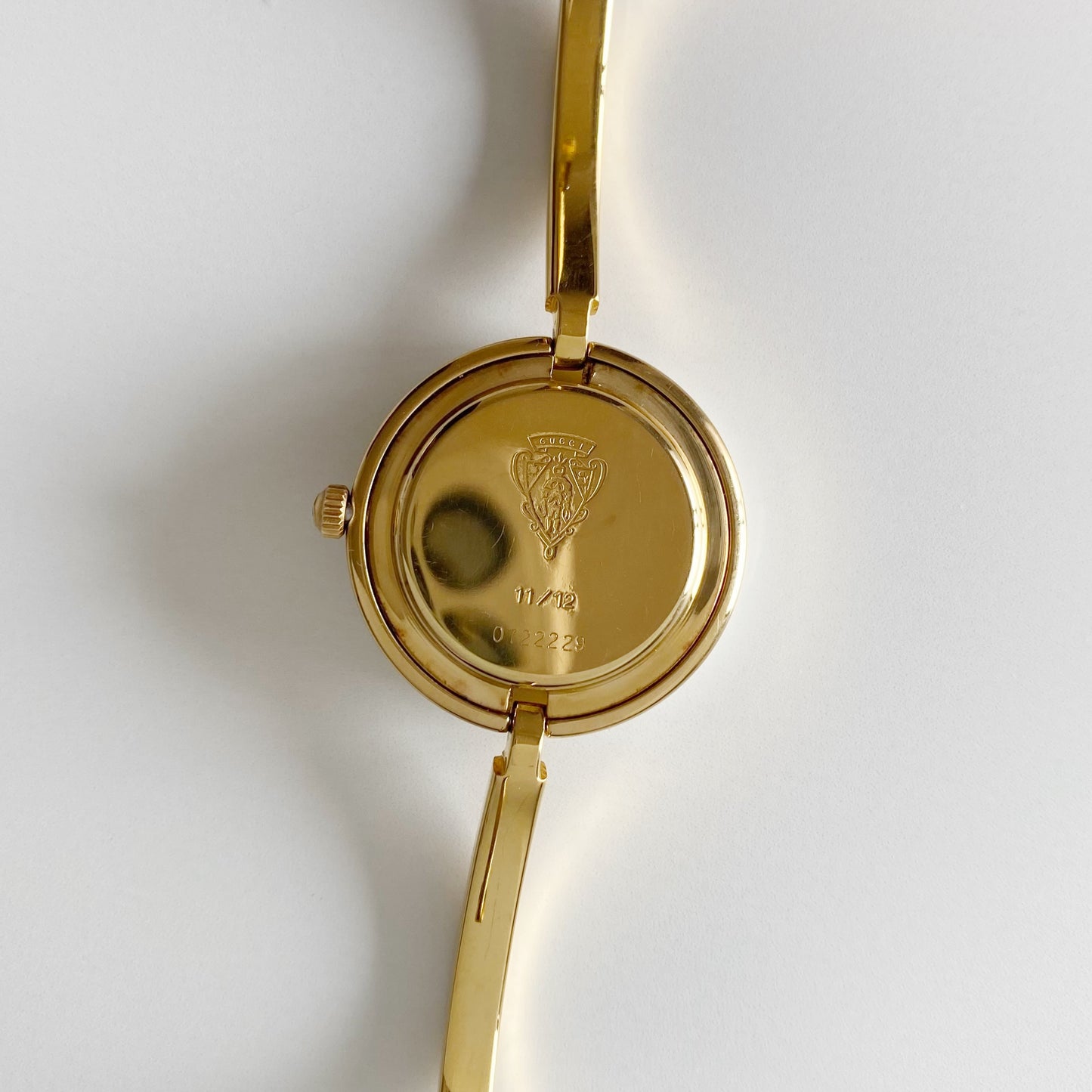 Gucci 1990s Interchangeable Bezel Gold Plated Bangle Watch with 12 bezels, case