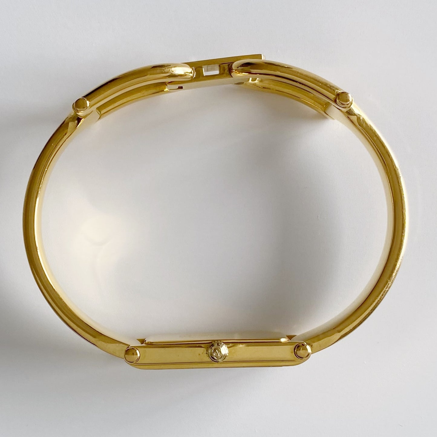 Gucci 1990s Gold Dial Rectangular  Gold Plated Bangle Watch