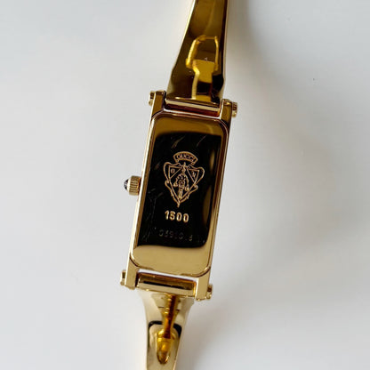 Gucci 1990s Black Dial Gold Plated Bangle Watch