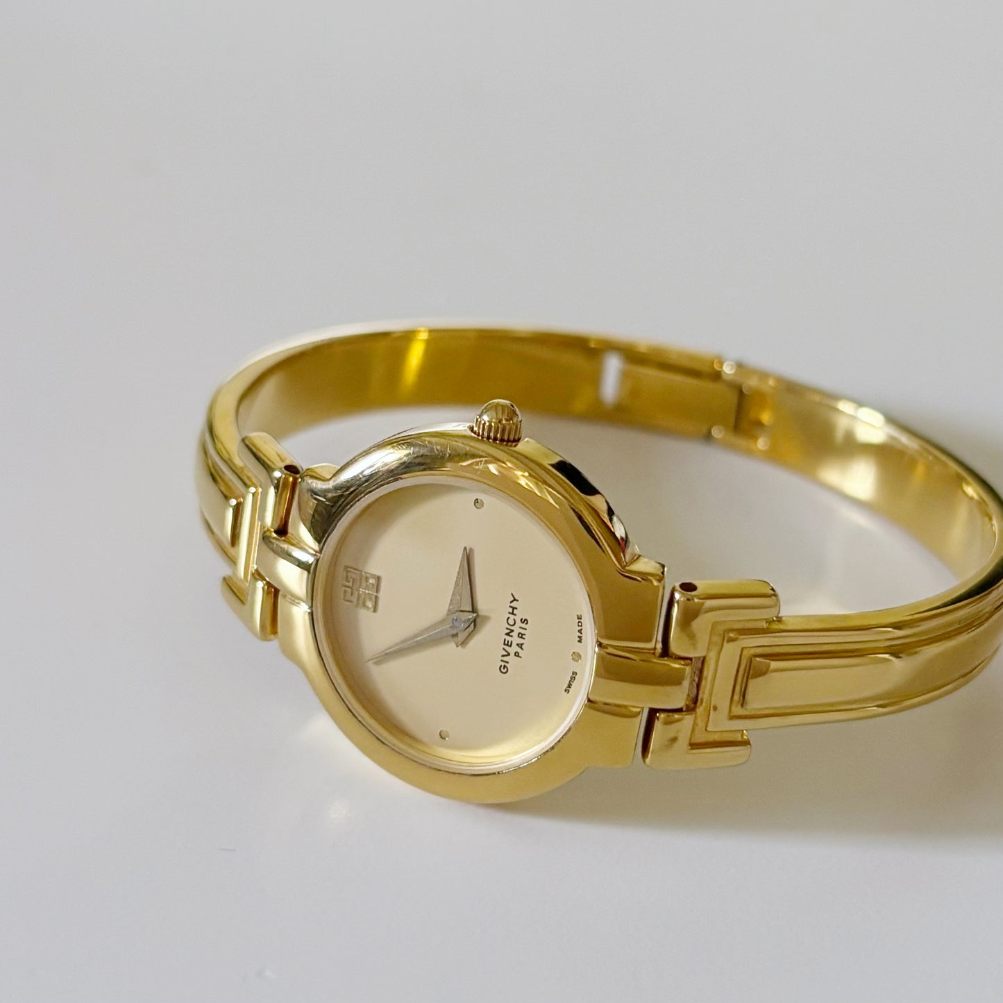 Givenchy 1990s Gold Plated Round Bangle Watch