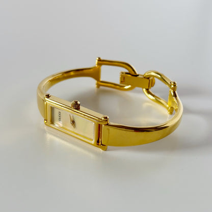 Gucci 1990s Rectangular Seashell Dial Gold Plated Bangle Watch