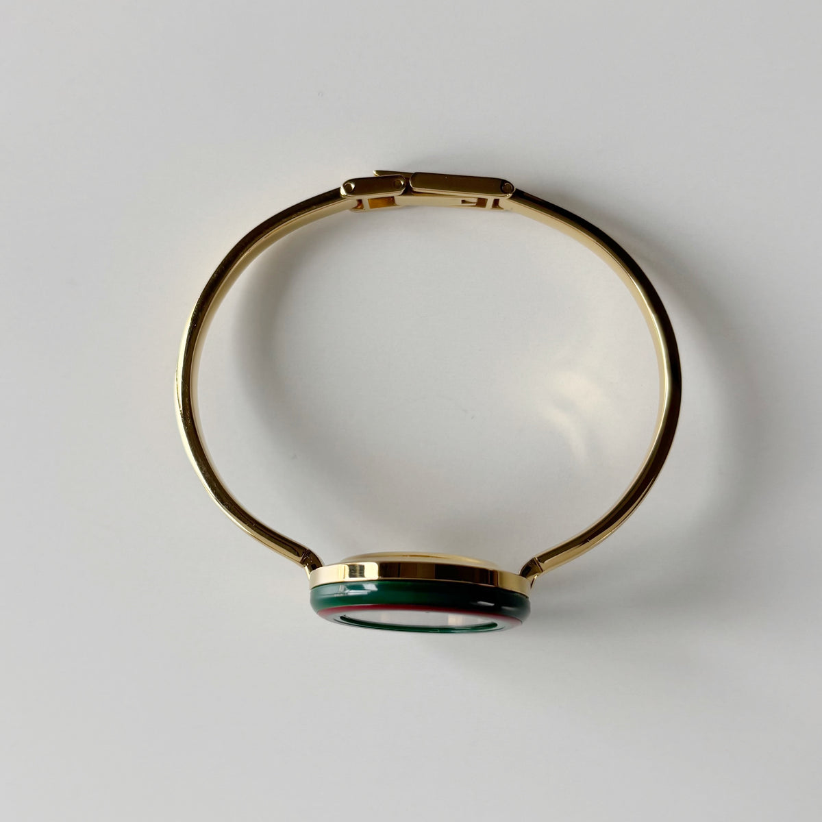 Gucci 1990s Interchangeable Bezel Gold Plated Bangle Watch with 12 bezels, case