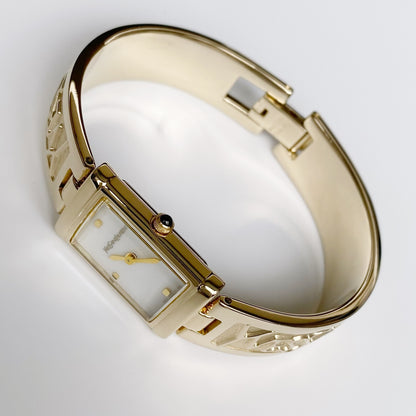 Yves Saint Laurent 1990s Seashell Dial Gold Plated Bangle Watch