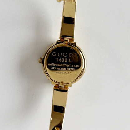 Gucci 1990s Round Dial Gold Plated Bangle Watch (Small)